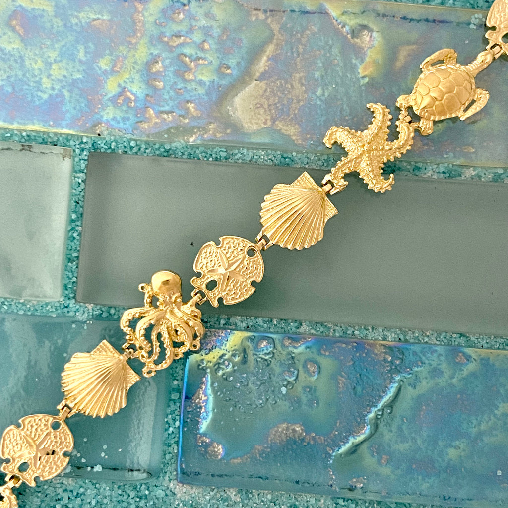 14k Yellow Gold Sea Life Bracelet 7 1/2”