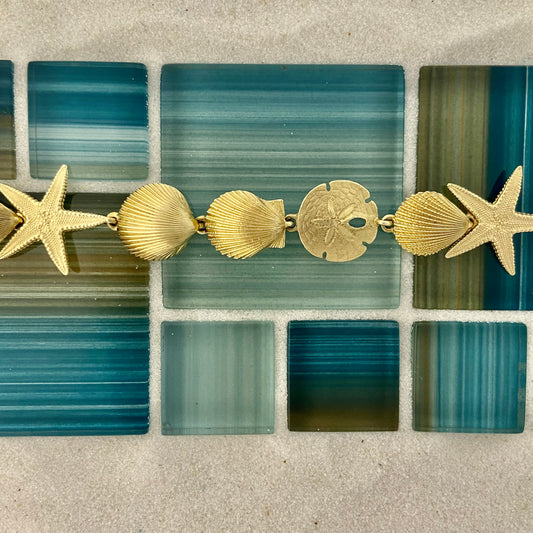 14k Yellow Gold Shell, Scallop, Starfish and Sand Dollar Bracelet 7 1/4”