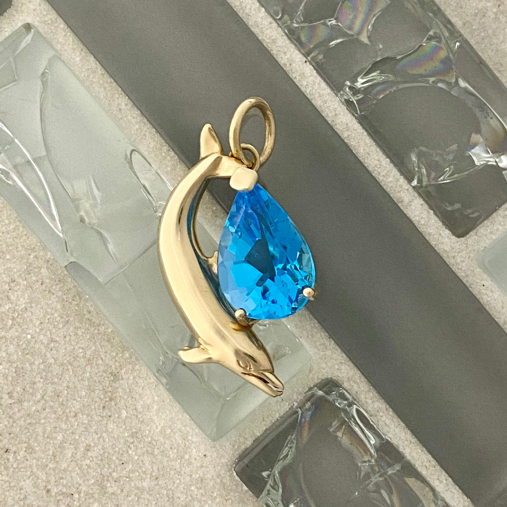 14k Yellow Gold Dolphin with Large Pear Shape Blue Topaz Pendant